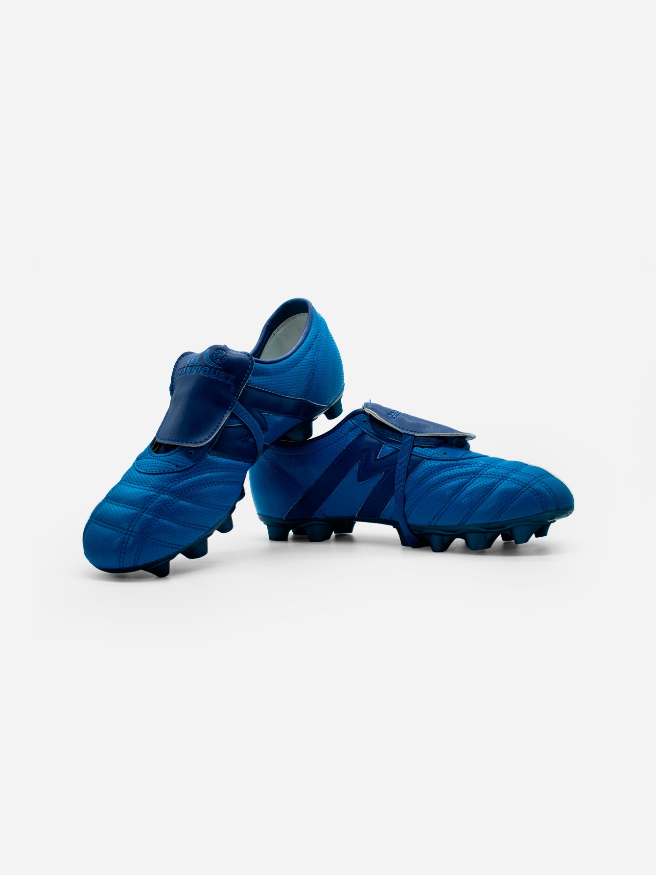 Tachones de fútbol Manríquez MID SX | Azul Metálico